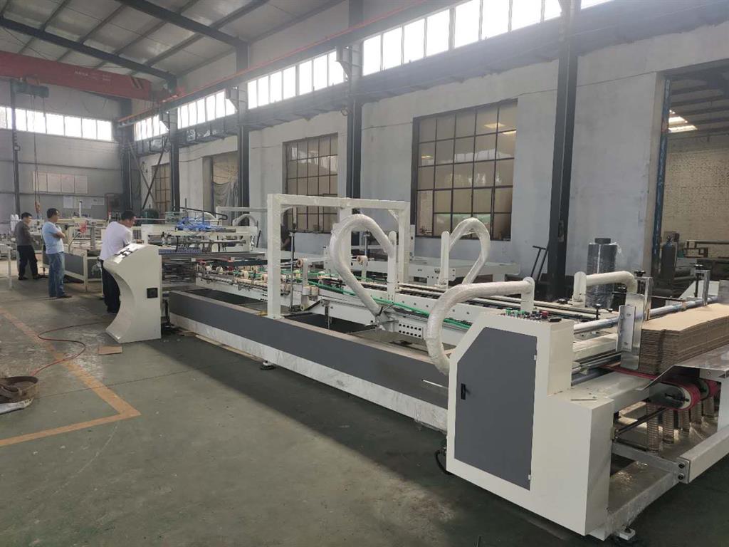 全自動(dòng)粘釘一體機(jī)